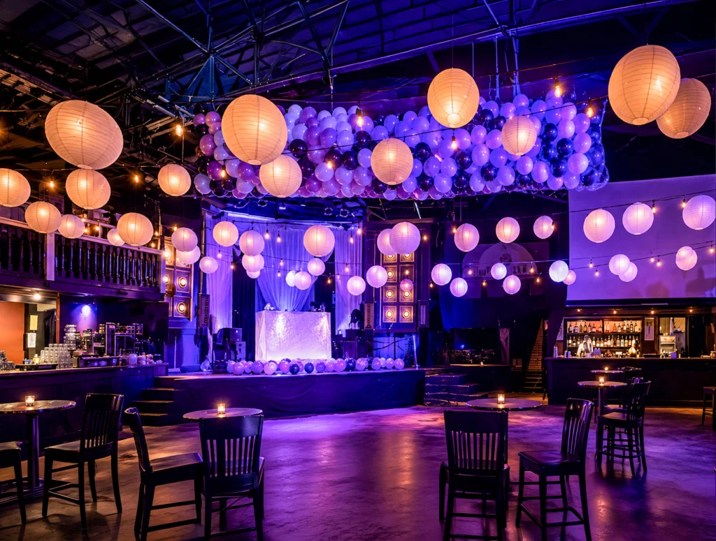 The theatre with hanging lanterns, balloons and purple event lighting